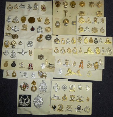 Lot 35 - A Collection of One Hundred and Fourteen Military Cap Badges, mainly staybrite, mounted on thirteen