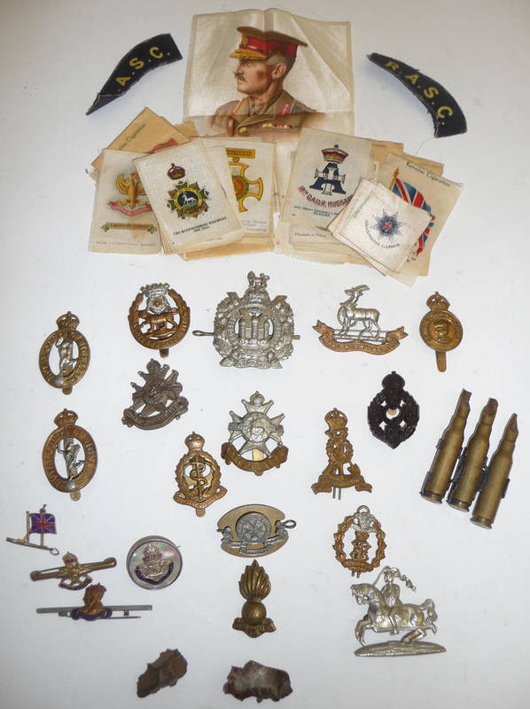Lot 39 - A Small Collection of Militaria, including fifteen cap badges, a Victory badge, three...