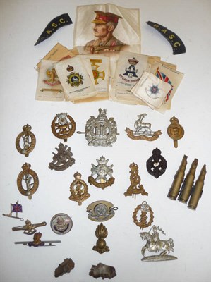 Lot 39 - A Small Collection of Militaria, including fifteen cap badges, a Victory badge, three...