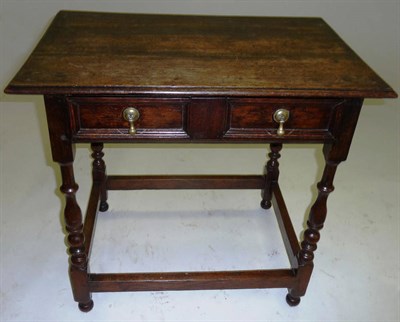 Lot 1410 - A Joined Oak Side Table, the rectangular boarded top above a single two-as-one frieze drawer...