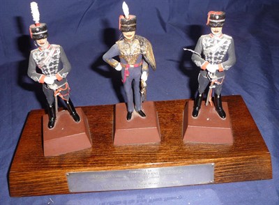 Lot 72 - A Set of Three Painted Composition Figures of Dragoon Officers, each standing on a square...
