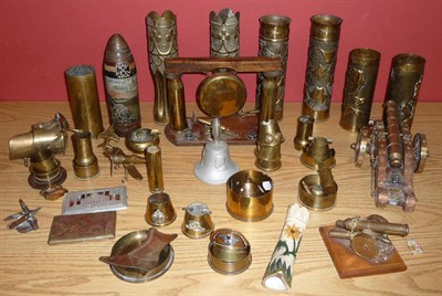 Lot 81 - A Collection of Trench Art, including three pairs of embossed and chased shell cases, prisoner...