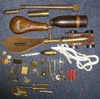 Lot 85 - A Quantity of Militaria, including a small model cannon, a copper powder flask, a leather shot...
