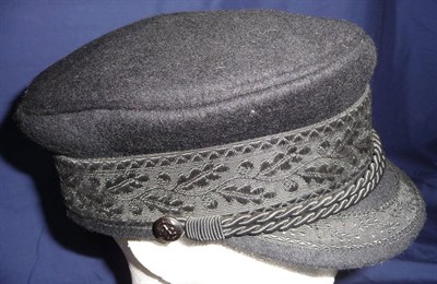 Lot 101 - An Imperial German Naval Officer's Peaked Cap, in black wool with acorn and oak leaf brocade ribbon