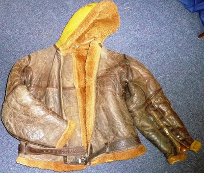 Lot 125 - An RAF Coastal Command Irvin Jacket, in sheepskin, the exterior of the hood painted yellow for high