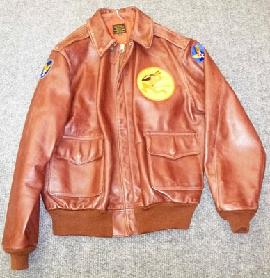 Lot 126 - A US Type A-2 Tan Leather Flying Jacket, size 44, with front zip fastening, the pull stamped TALON