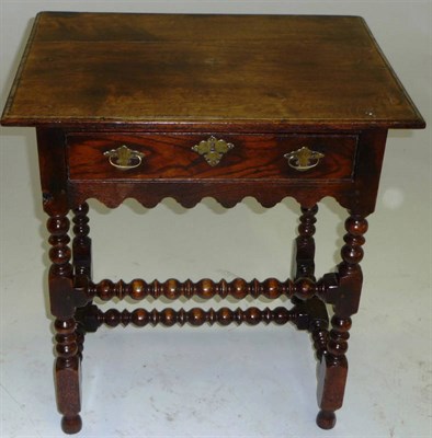 Lot 1416 - A 17th Century Style Joined Oak Side Table, the rectangular top above a single frieze drawer...