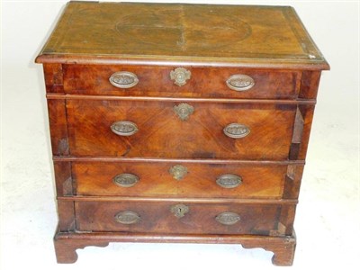 Lot 1419 - A Late 17th Century Joined Oak and Walnut Veneered Four Drawer Chest, the quarter veneered...