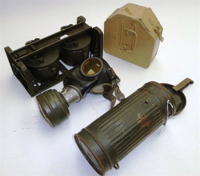 Lot 158 - A Second World War German M38 Gas Mask with FE41 Filter, size 2, with additional lenses, eagle...