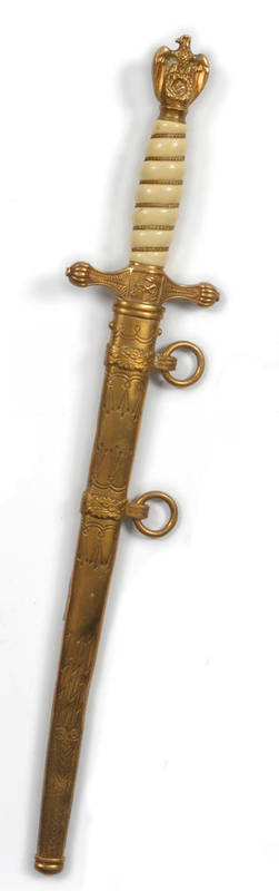 Lot 164 - A German Third Reich Naval Dirk, the double fullered steel blade etched with a fouled anchor...