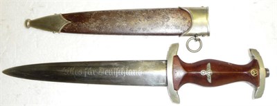 Lot 174 - A German Third Reich SA Dagger, the re-ground steel blade etched Alles fur Deutschland, with...