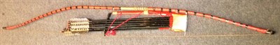 Lot 182 - A Japanese Samurai Yumi (Bow) and Quiver of Arrows, the black lacquered laminated wood yumi...