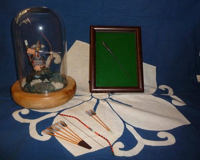 Lot 184 - A Small Signed Togari-Ya, in a glazed display case; a Model of a Samurai Archer, on a wooden plinth