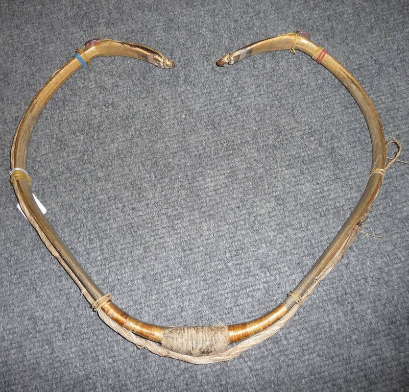 Lot 188 - A Korean Horn and Sinew Bow, with traces of the original birch bark covering and with cloth covered