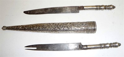 Lot 222 - An Early 19th Century European Travelling Eating Set, of two knives, one with bifurcated blade,...
