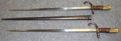 Lot 228 - Two French Model 1874 Gras Sword Bayonets, one dated 1879 on the back edge, with steel...