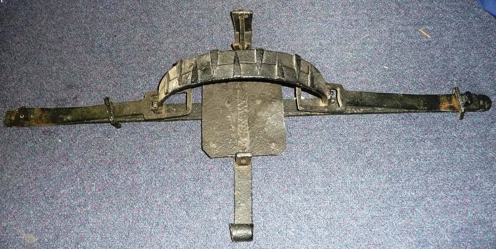 Lot 234 - A 19th Century Iron Man Trap, the semi circular jaws with nine triangular teeth, with tilting...