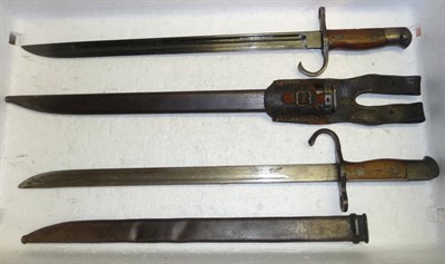 Lot 246 - A Japanese "Type 30" Arisaka Bayonet, the fullered steel blade stamped with the stacked cannon...