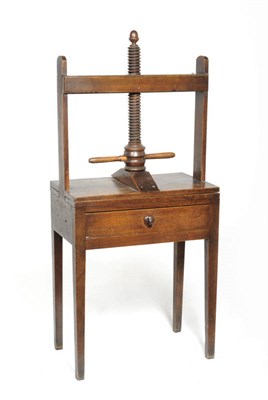 Lot 1429 - An Oak and Fruitwood Side Table with Linen Press, early 19th century, the screw thread with...