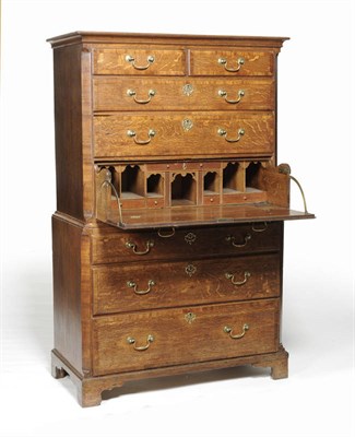 Lot 1430 - A George III Oak Secretaire Chest on Chest, late 18th century, the cavetto moulded cornice...