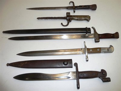Lot 267 - A Spanish Mauser Bolo Bayonet, the blade numbered 7330 B, with chequered wood grip scales,...