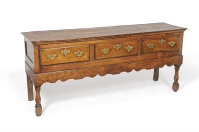 Lot 1431 - An 18th Century Joined Oak Low Dresser, probably North West, circa 1780, the three-plank top...