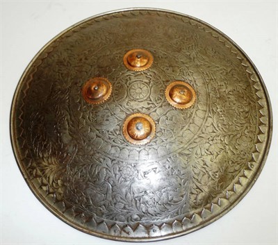 Lot 286 - A Late 18th/Early 19th Century Indian Steel Dhal, of convex circular form, the folded rim with...