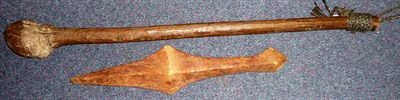 Lot 295 - A Solomon Islands Palm Wood Club, of elongated diamond section, with waisted grip and swelling...