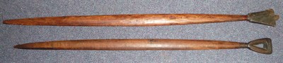 Lot 296 - A South Sea Islands Wood Sword Club, of slender form, the pierced spade shape butt carved with...