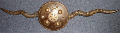 Lot 300 - A 19th Century Indian Steel Hand Shield, of convex circular form, set with four brass bosses, a...