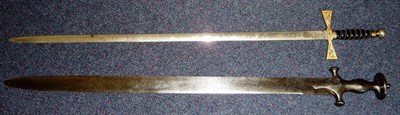 Lot 309 - An Early 19th Century Indian Talwar/Khanda, the 75cm straight steel blade double edged for the last