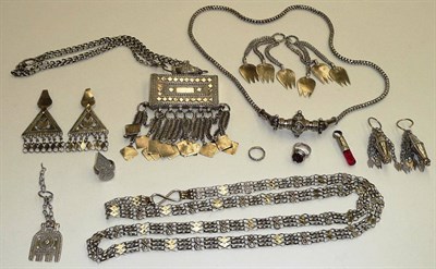 Lot 324 - A Collection of Omani Silver and White Metal Jewellery, comprising a "Hirz" (Koran holder) of...