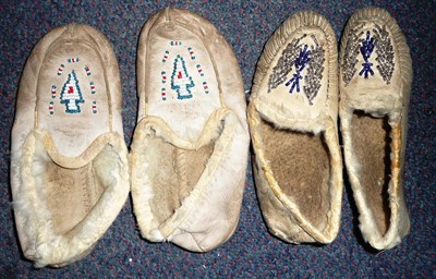 Lot 336 - Two Pairs of North American Indian Moccasins, for a child, each of soft cream leather decorated...
