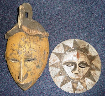 Lot 337 - A Baule Wood Dance Mask, the domed oval face with slit eyes, long aquiline nose and mouth with...