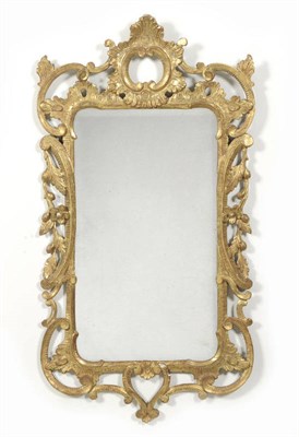 Lot 1438 - A George III Giltwood and Gesso Mirror, late 18th century, the rectangular bevelled glass plate...