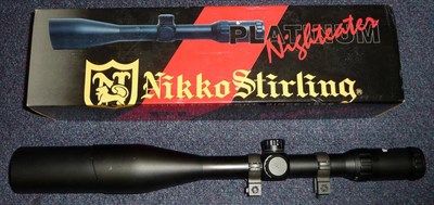 Lot 355 - A Nikko Stirling Platinum Nighteater 30mm 6-24x56 Rifle Scope, in original box with instructions