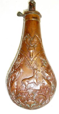 Lot 364 - A Large Copper Powder Flask by James Dixon & Sons, Sheffield, richly embossed with a stag...