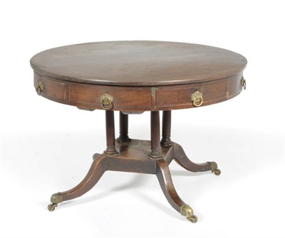 Lot 1445 - A Mahogany Drum Table, early 19th century, the circular top with four real and four sham...