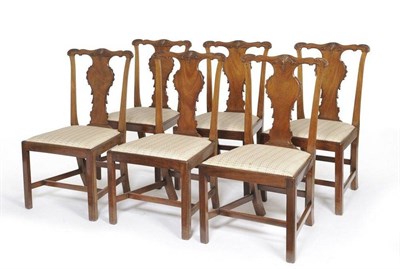 Lot 1449 - A Set of Six George III Mahogany Dining Chairs, late 18th century, the wavy shaped top rails...