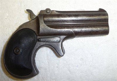 Lot 483 - A Remington Over and Under Double Barrel Deringer, with 7.5cm steel barrels, the top flat...