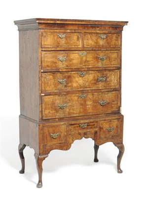 Lot 1452 - A George II Walnut Chest on Stand, early 18th century, the bold cornice above two short and...