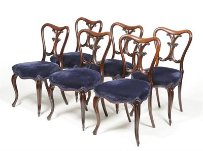 Lot 1454 - A Set of Six Victorian Rosewood Dining Chairs, late 19th century, upholstered in blue velvet,...