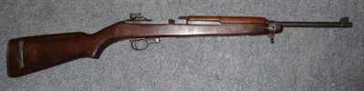 Lot 512 - A Deactivated U.S. Carbine Cal.30, numbered 5687095, with walnut semi pistol grip stock, barrel...