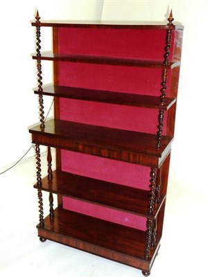 Lot 1455 - A Rosewood Six-Tier Open Bookcase, of rectangular form with spiral turned uprights, raised on...