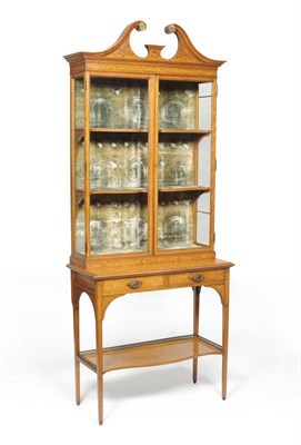 Lot 1457 - A George III Style Satinwood Display Cabinet, stamped Maple & Co, late 19th century, the broken...