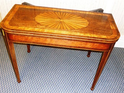 Lot 1458 - A Rosewood, Satinwood and Ebony Strung Foldover Card Table, the hinged top inlaid with an oval...