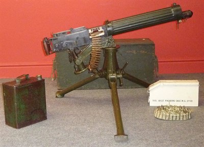 Lot 556 - A Deactivated Vickers Heavy Machine Gun, numbered H1985, with .303 belt, belt box, petrol can...