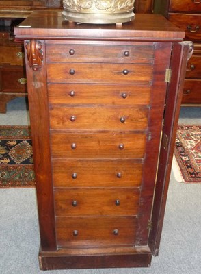 Lot 1461 - A Victorian Rosewood Wellington Chest, of eight graduated drawers, turned mushroom shaped...