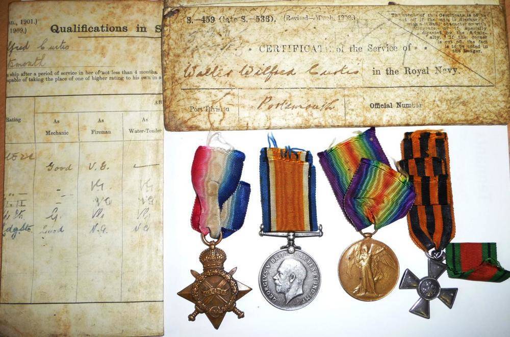 Lot 52 - A First World War Group of Four Medals, awarded to K.7184, W.W.CURTIS, ACT.L.STO.R.N., comprising a