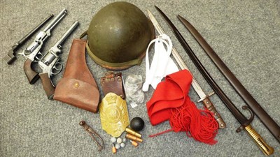 Lot 78 - A Quantity of Militaria, comprising a US helmet with fibreglass liner, a leather pistol...